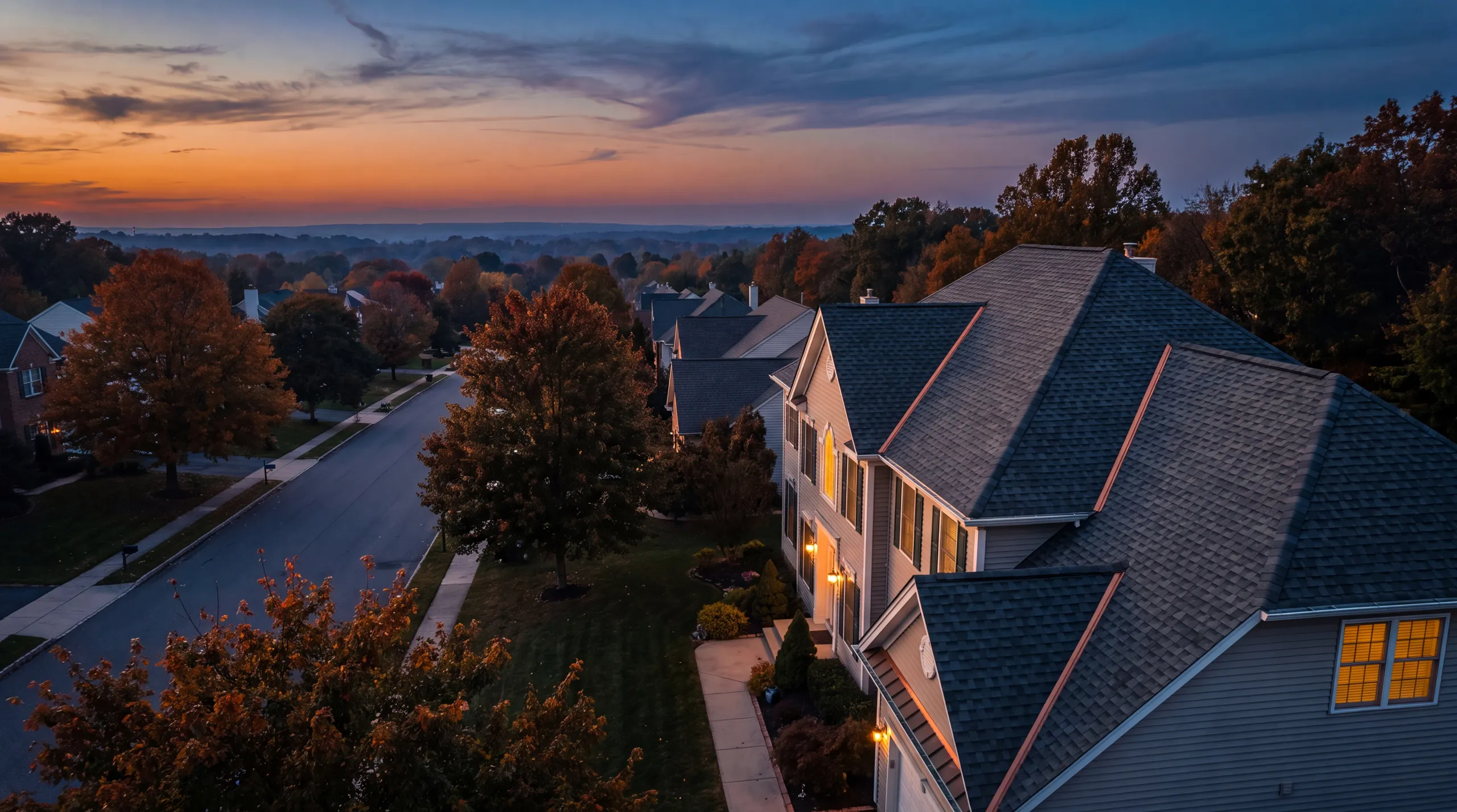 Aerial dusk view of a New Jersey home with a newly installed roof